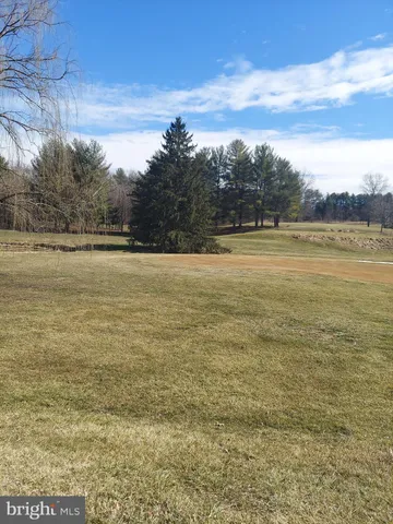 a view of an ocean and mountain