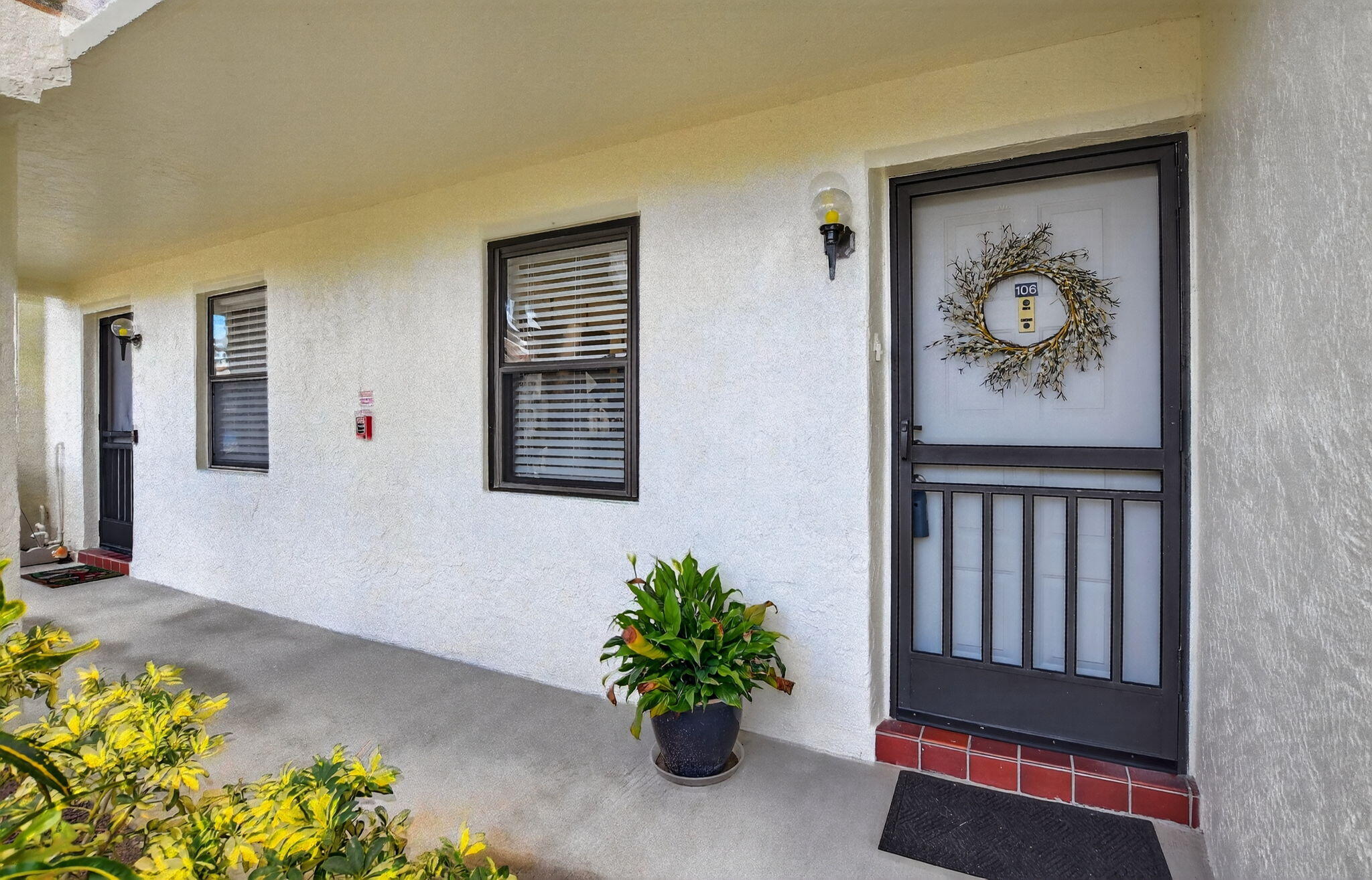 22052 Palms Way, Unit 106 Boca Raton, FL 33433 - Photo 2 of 13 Front Porch