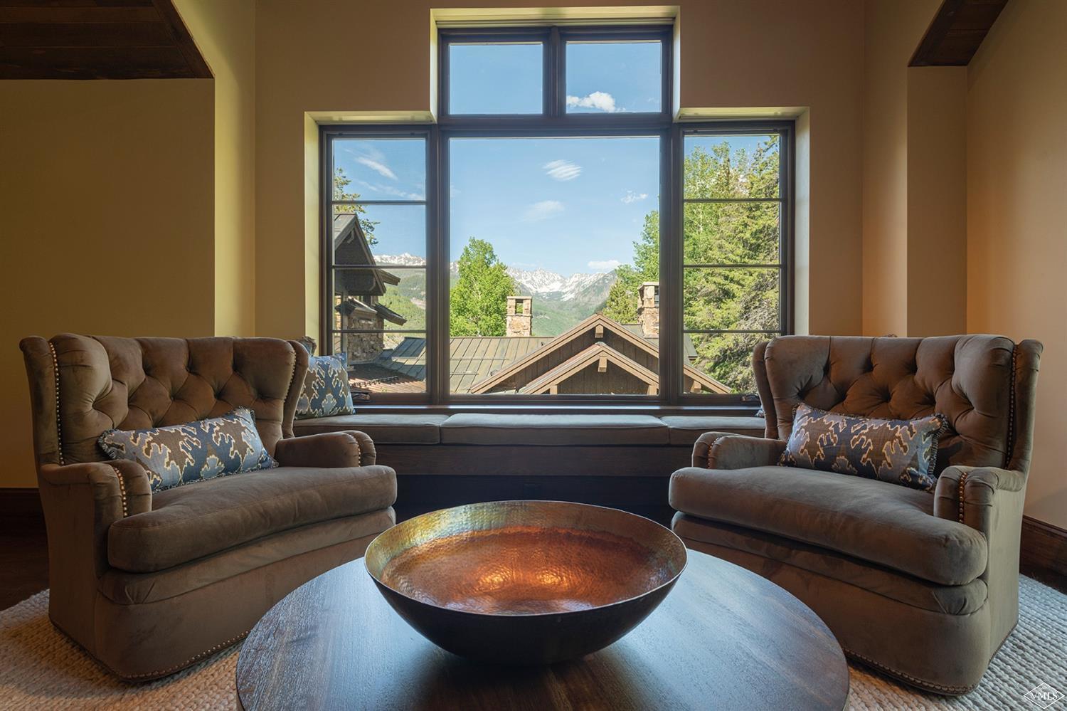 1183 Cabin Circle Vail, CO 81657 - Photo 16 of 19 a living room with furniture and a large window