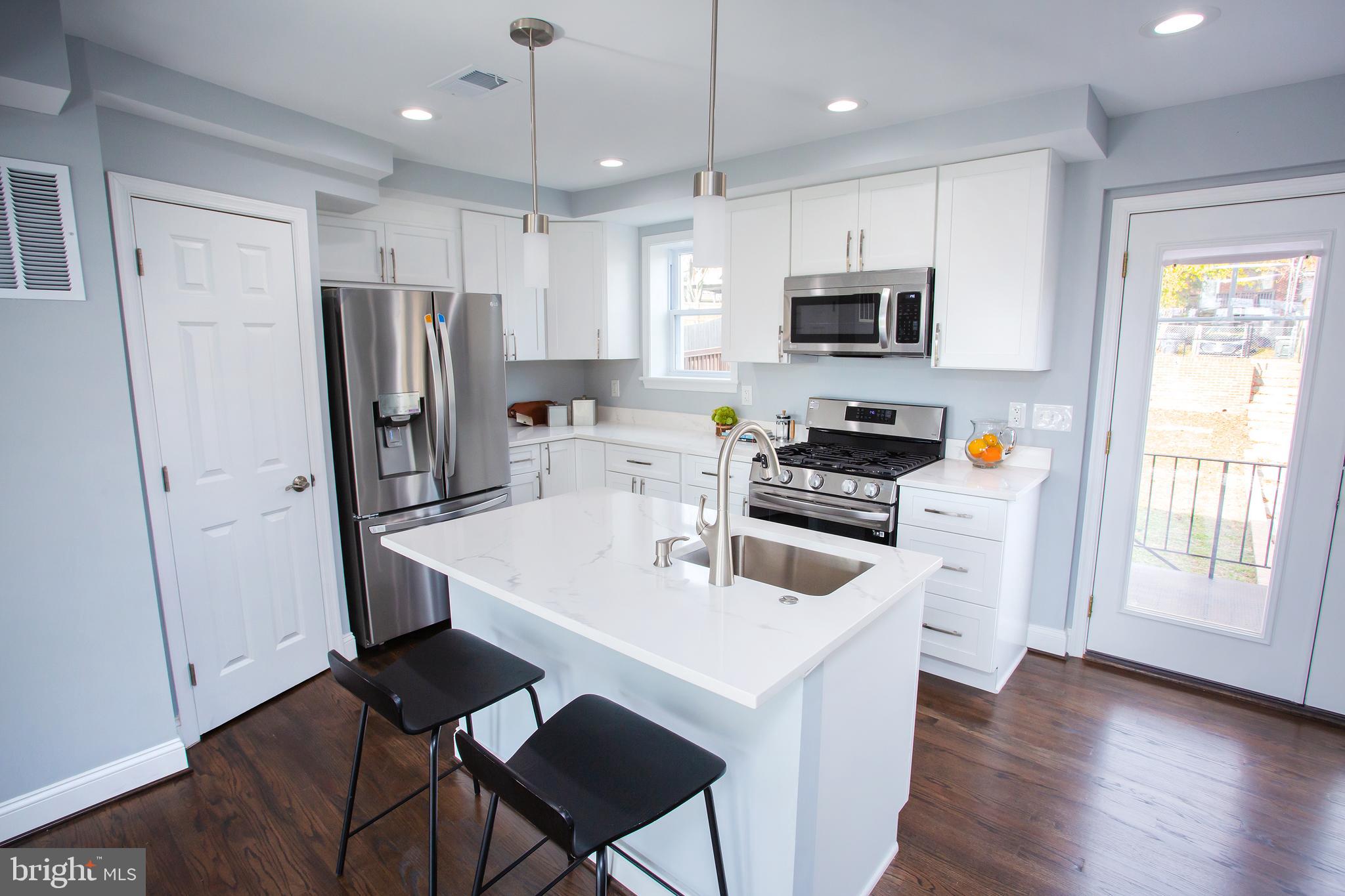 1364 W Street Northeast Washington, DC 20018 - Photo 12 of 80 A social "Stone & Stainless" Kitchen!