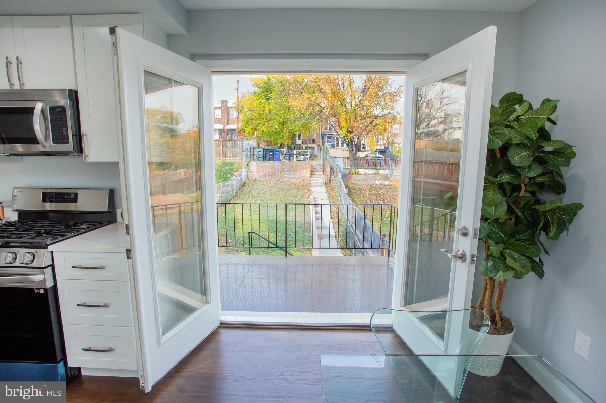 1364 W Street Northeast Washington, DC 20018 - Photo 64 of 80 French doors open to rear patio deck