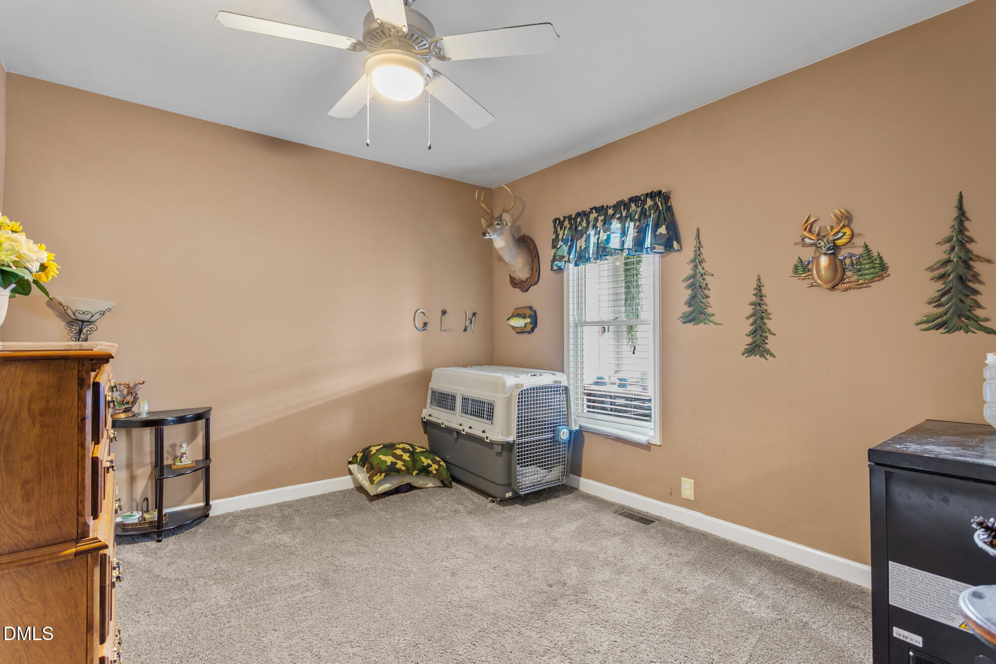 3163 Saul Loop Road Elon, NC 27244 - Photo 17 of 44 a view of a livingroom with furniture and a window