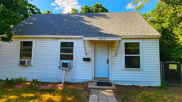 a view of front of house with a yard