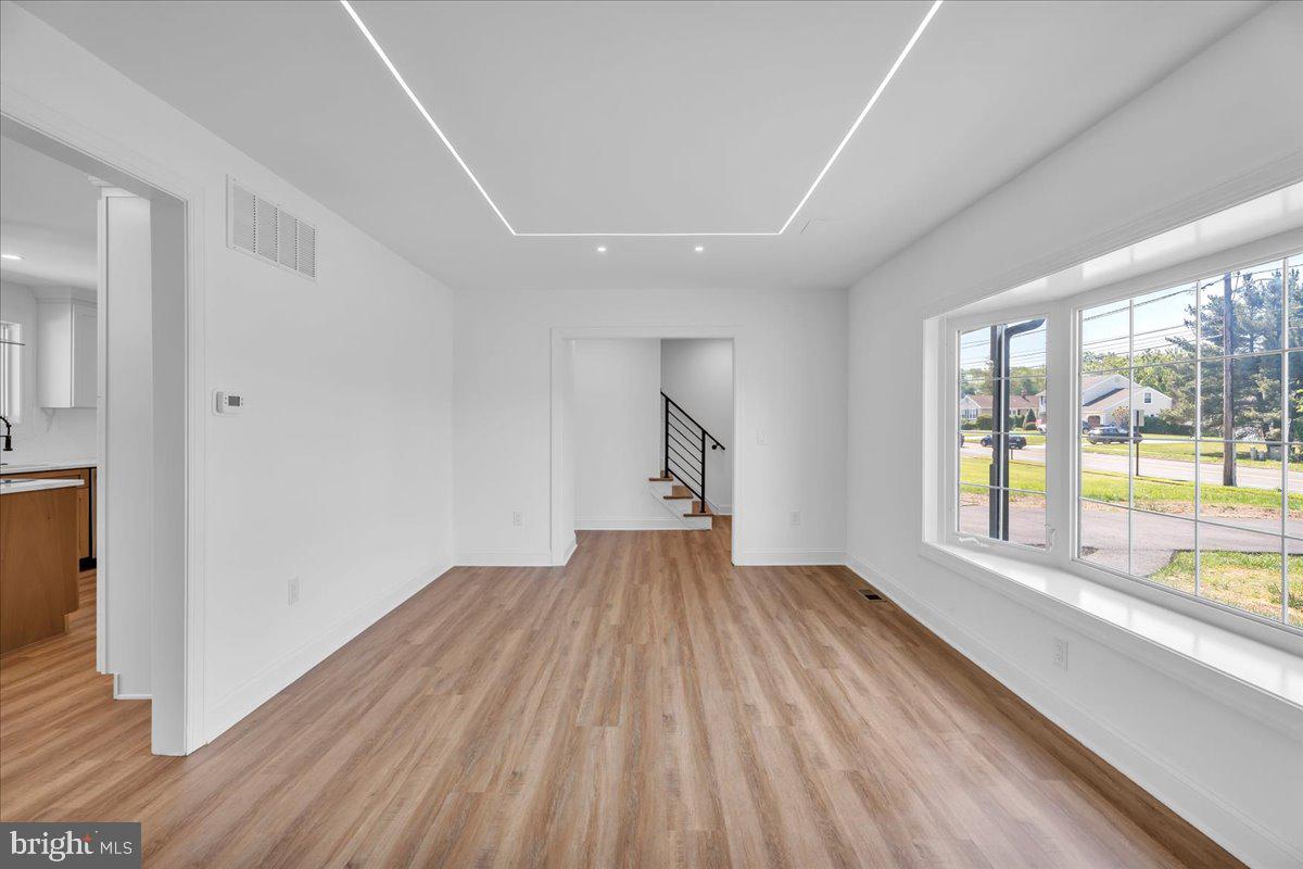 2504 Church Road Cinnaminson, NJ 08077 - Photo 10 of 79 wooden floor in an empty room with a window