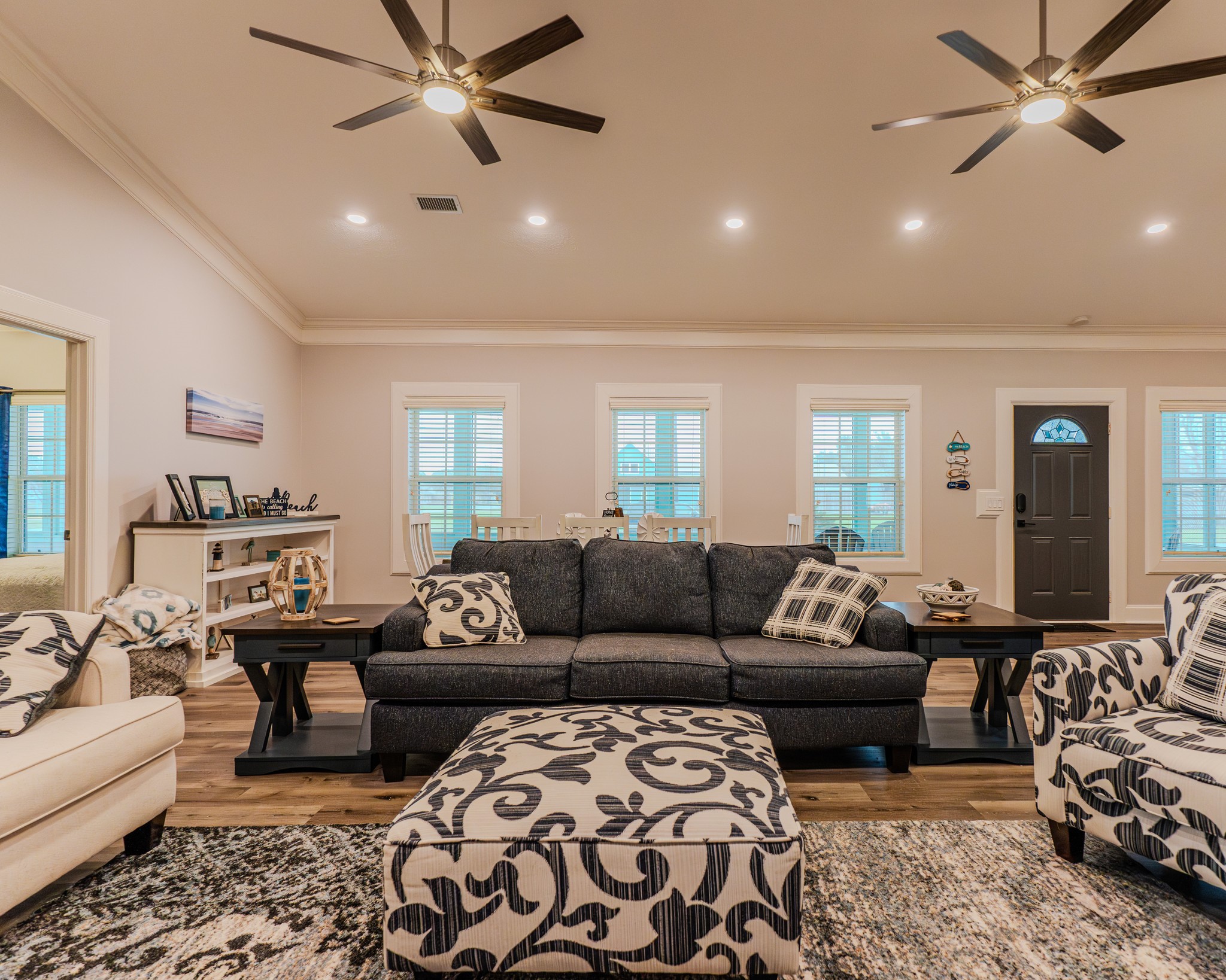 837 Wightman Street Matagorda, TX 77457 - Photo 20 of 45 a living room with furniture ceiling fan and a rug