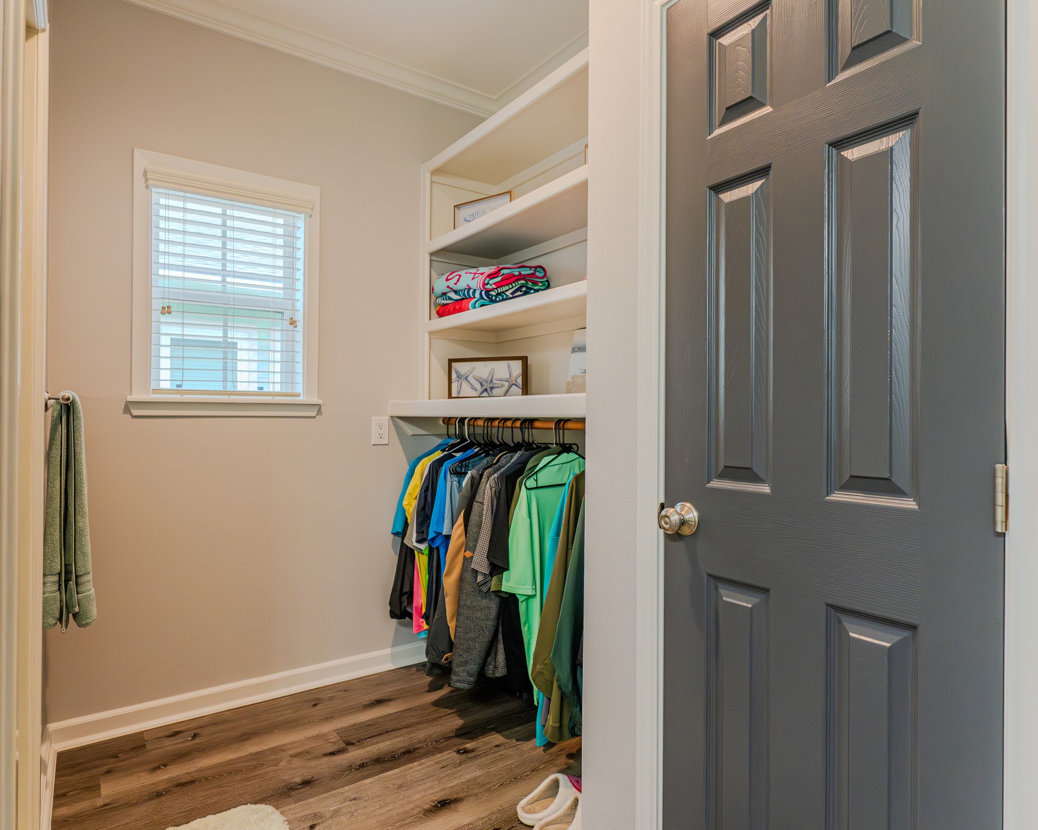 837 Wightman Street Matagorda, TX 77457 - Photo 26 of 45 a view of walk in closet with clothes and shoes
