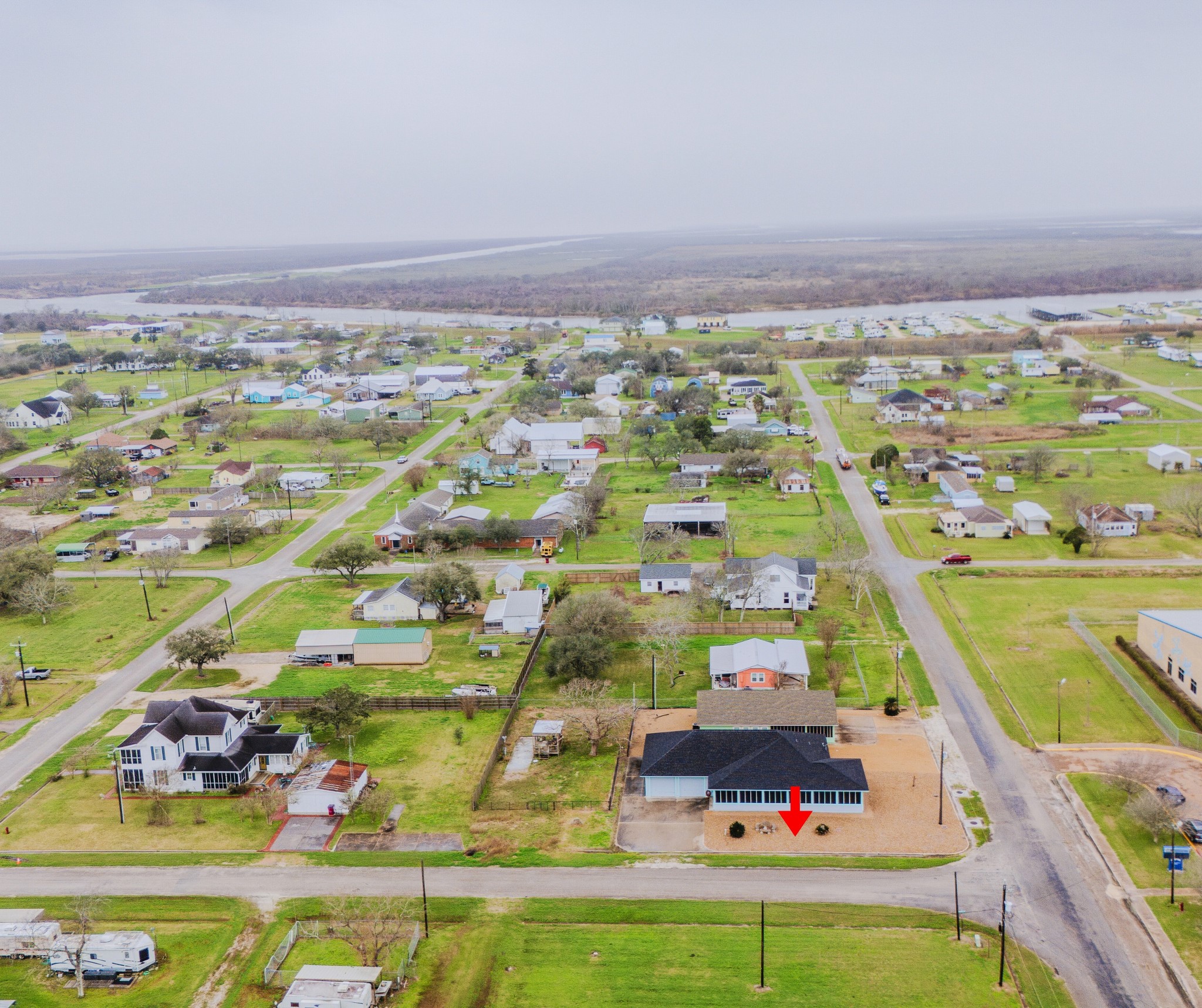 837 Wightman Street Matagorda, TX 77457 - Photo 41 of 45 an aerial view of residential houses with outdoor space