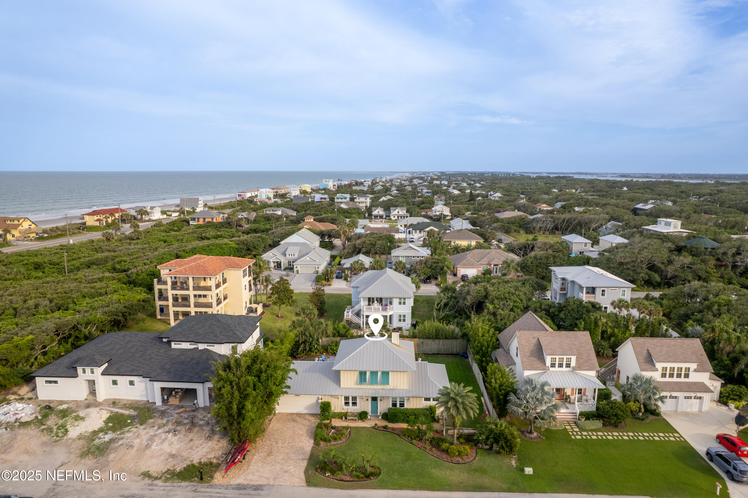 211 10th Street St. Augustine, FL 32080 - Photo 2 of 47 an aerial view of a house with a garden