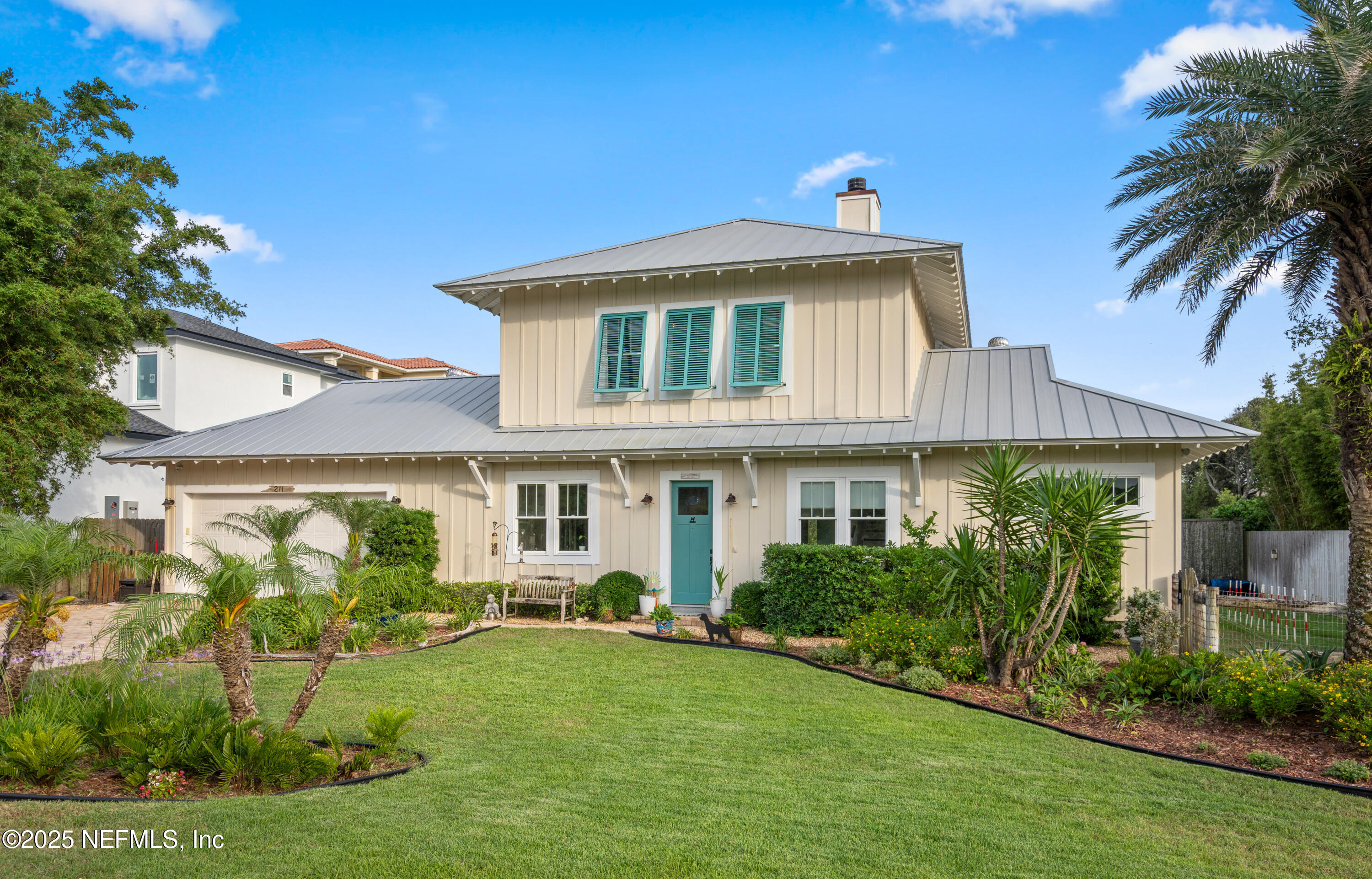 211 10th Street St. Augustine, FL 32080 - Photo 33 of 47 a front view of a house with a yard
