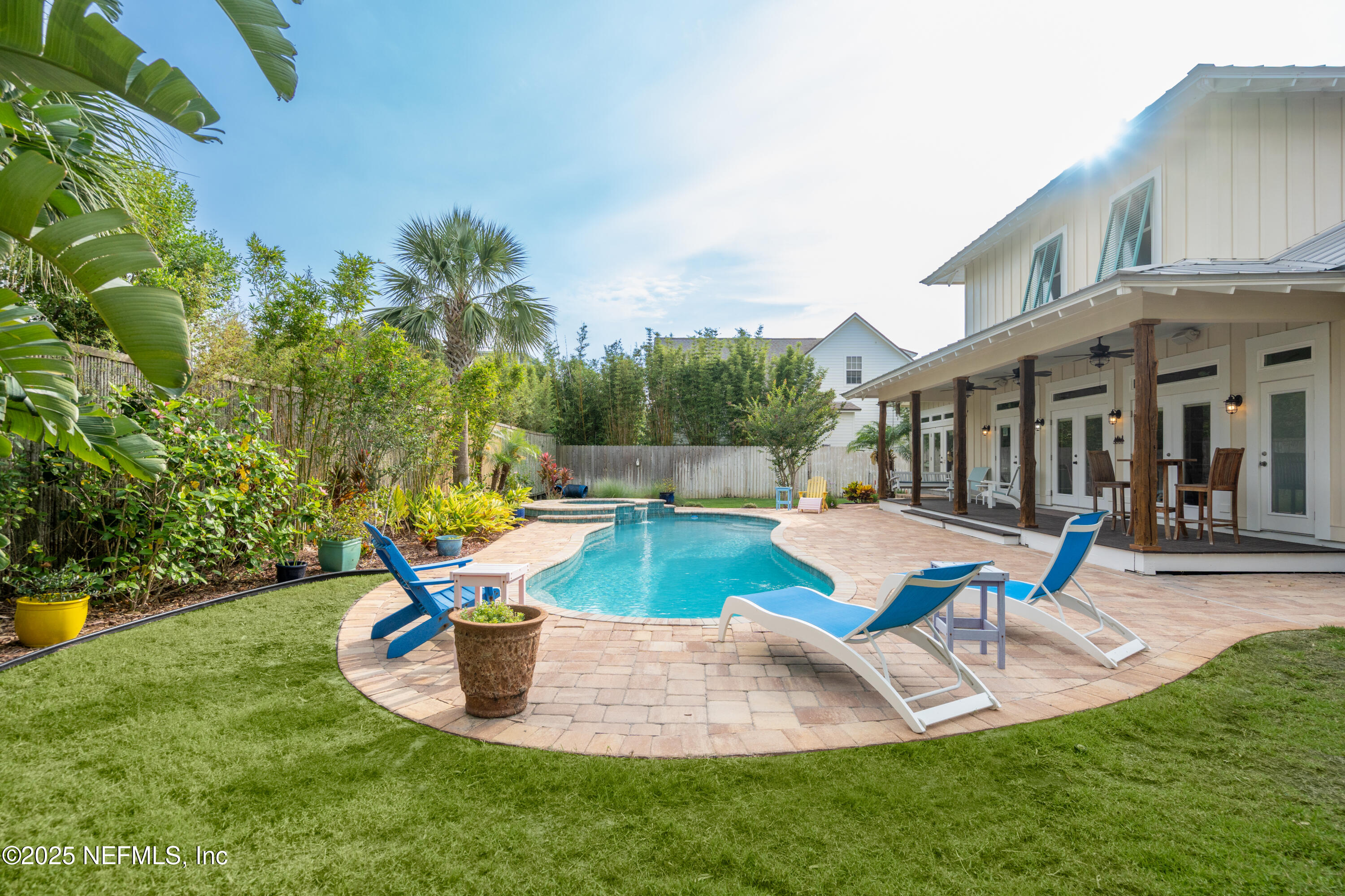 211 10th Street St. Augustine, FL 32080 - Photo 35 of 47 a view of a house with swimming pool and sitting area