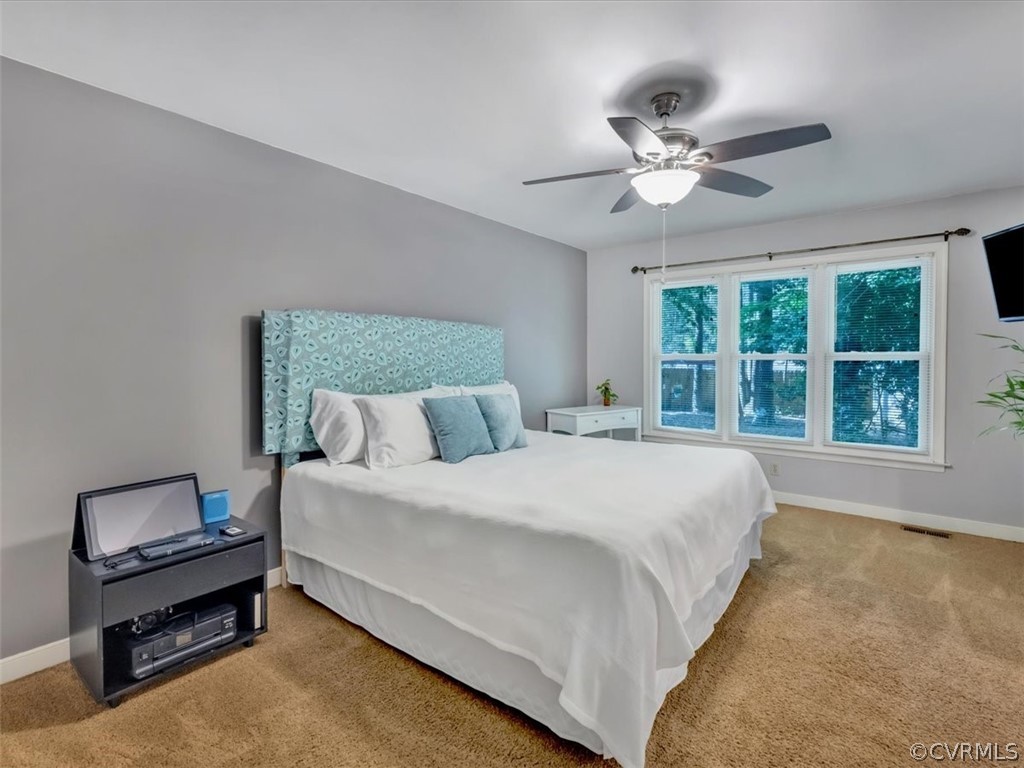 7024 Pointer Ridge Road Midlothian, VA 23112 - Photo 13 of 24 a bedroom with a bed and window
