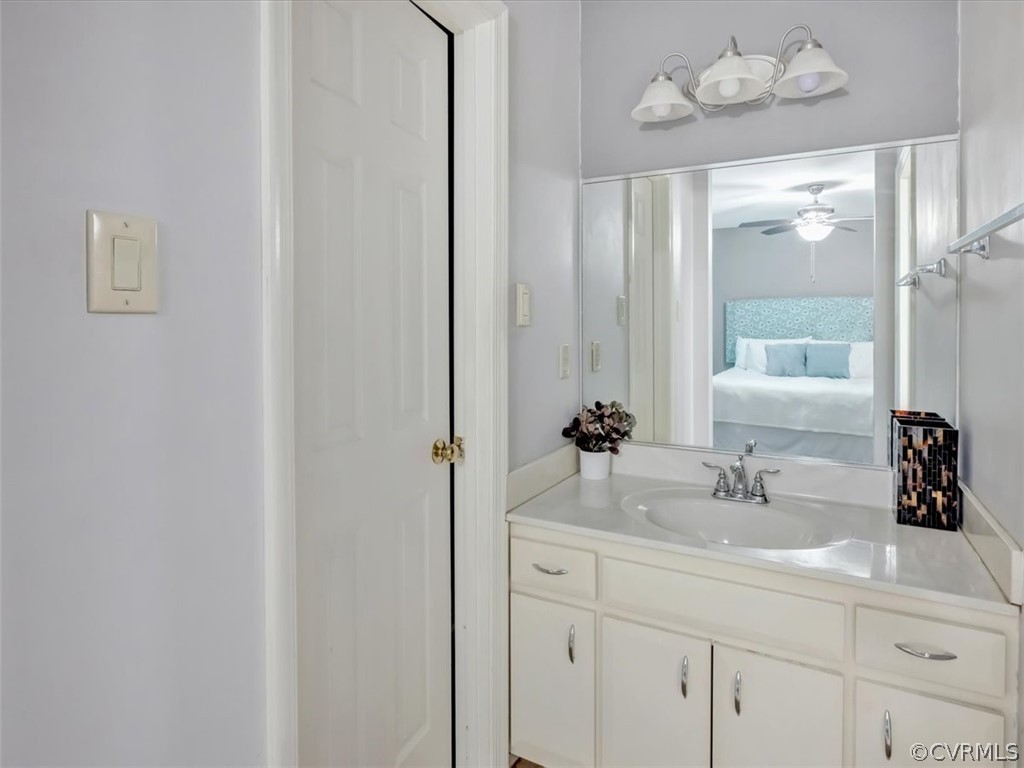 7024 Pointer Ridge Road Midlothian, VA 23112 - Photo 15 of 24 a bathroom with a sink and a mirror