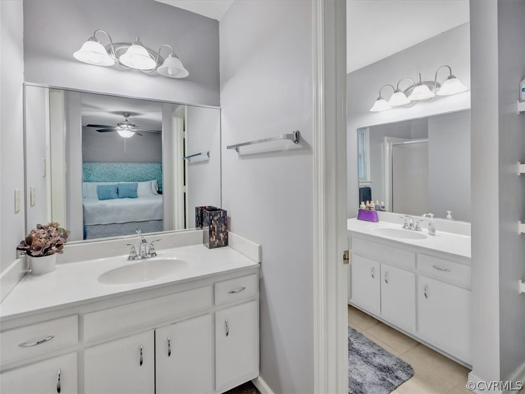 7024 Pointer Ridge Road Midlothian, VA 23112 - Photo 16 of 24 a bathroom with a sink vanity and a mirror