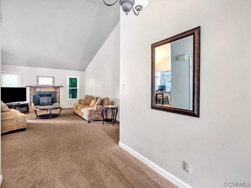 7024 Pointer Ridge Road Midlothian, VA 23112 - Photo 3 of 24 a living room with furniture and a flat screen tv