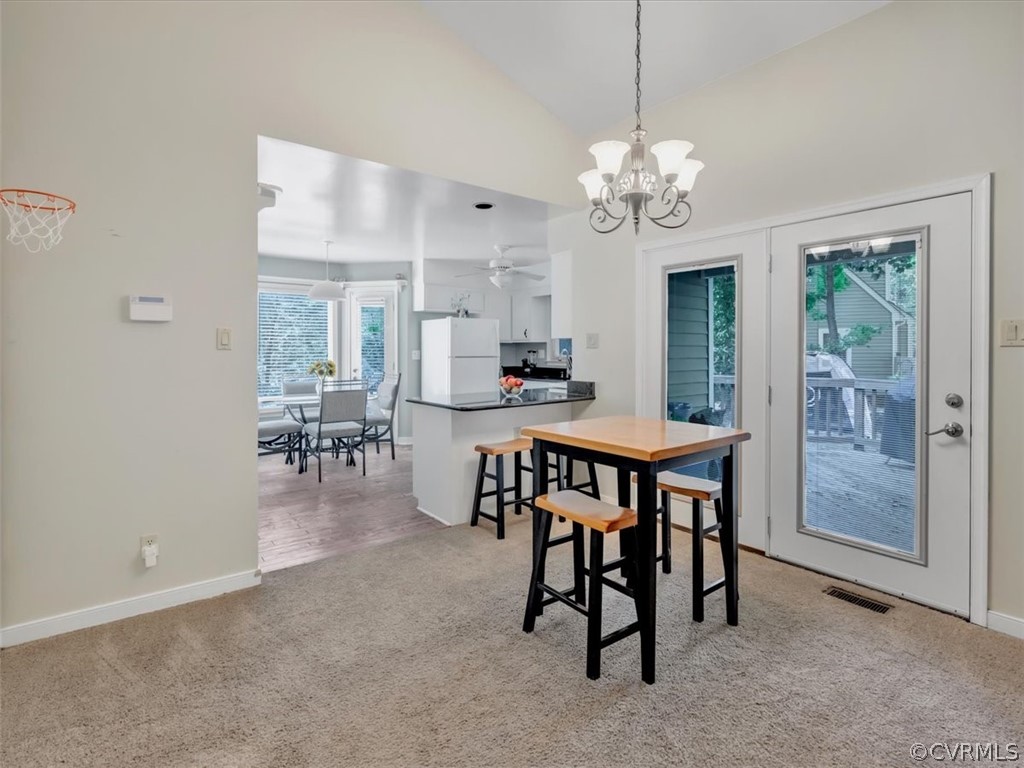 7024 Pointer Ridge Road Midlothian, VA 23112 - Photo 7 of 24 a view of a dining room with furniture window and outside view