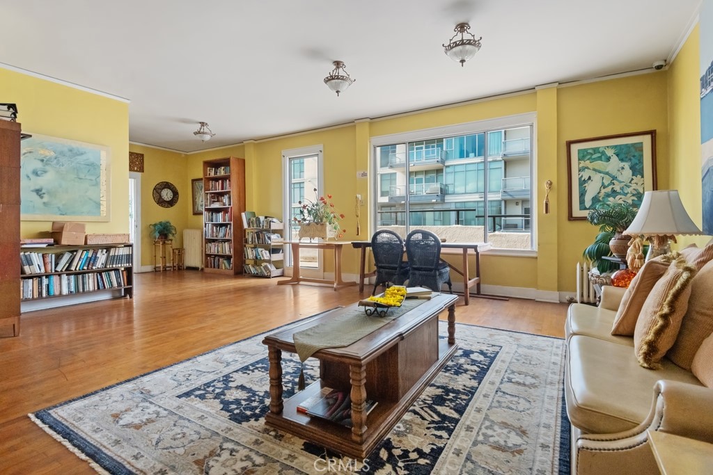 360 West Ocean Boulevard, Unit 706 Long Beach, CA 90802 - Photo 17 of 22 a living room with furniture and a flat screen tv