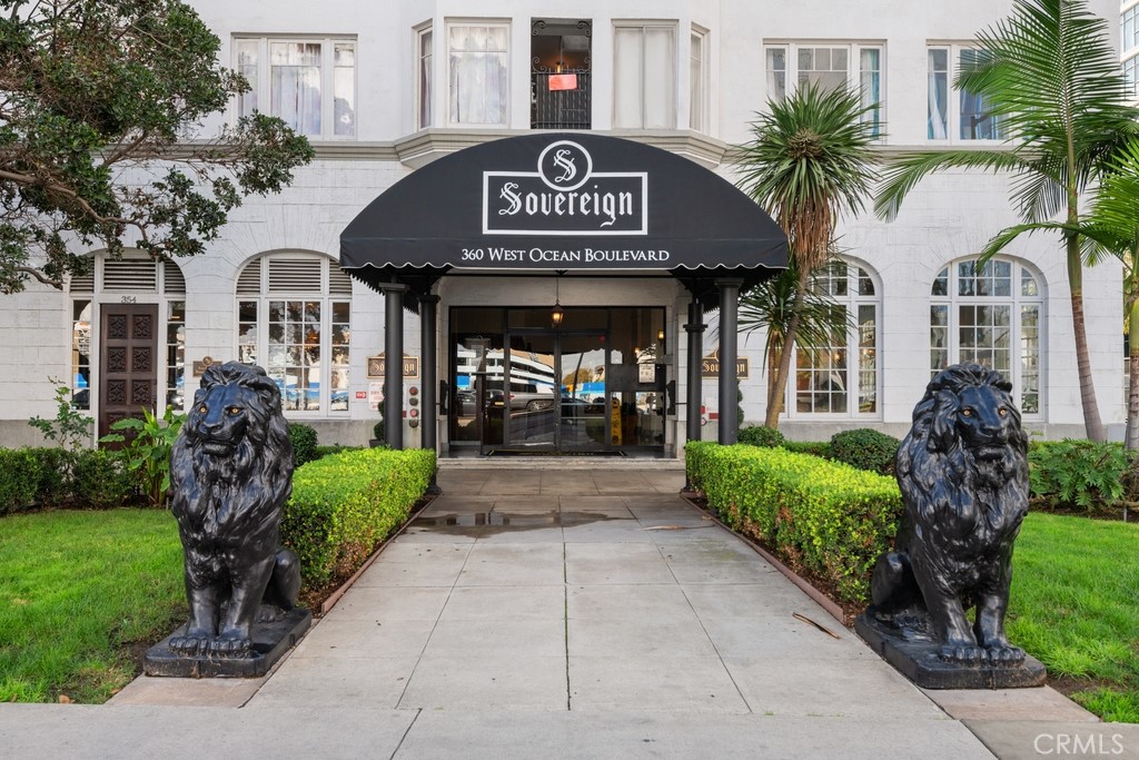 360 West Ocean Boulevard, Unit 706 Long Beach, CA 90802 - Photo 2 of 22 a view of a brick house with a clock on the side