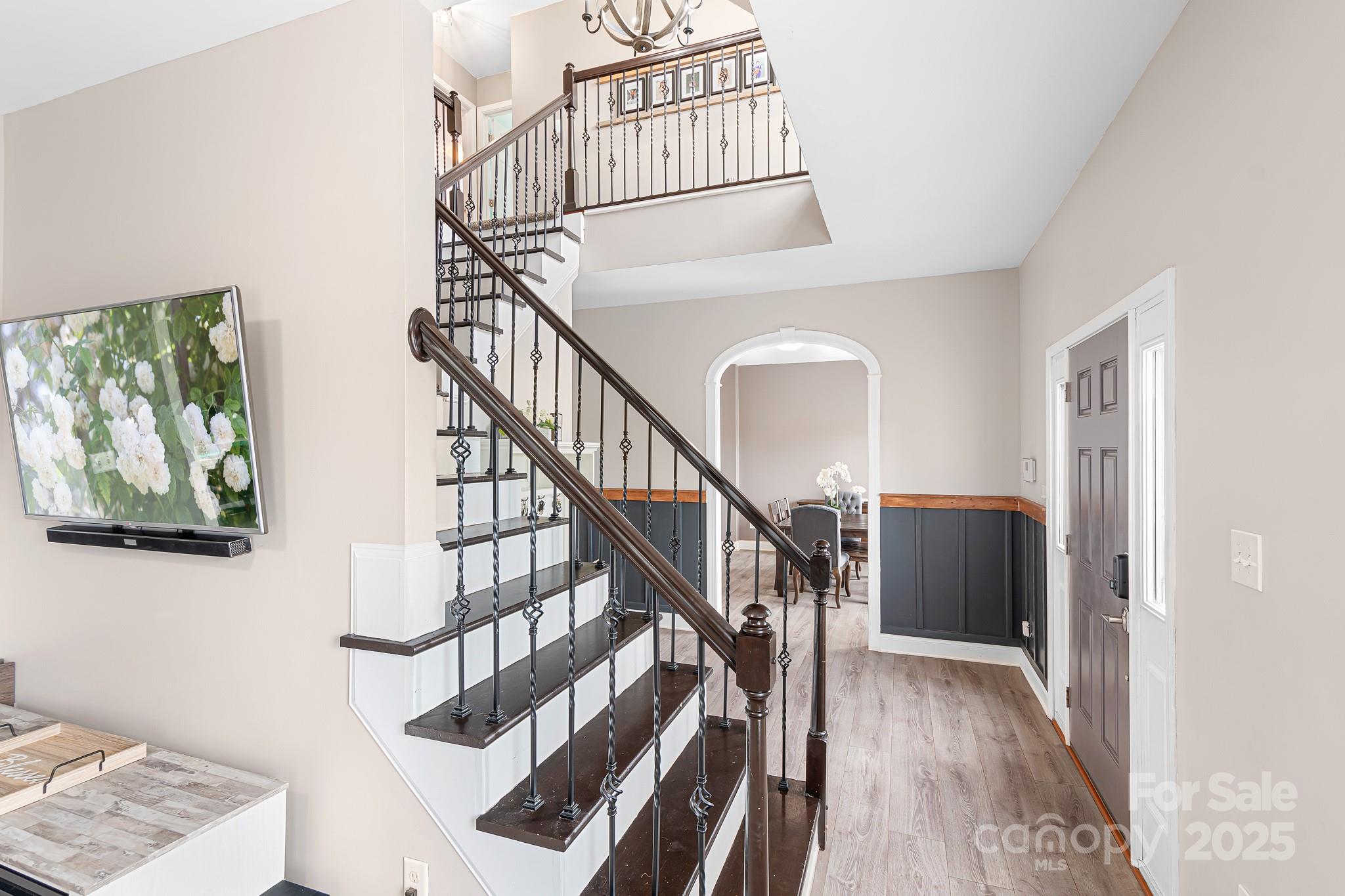4654 Rocky Hollow Road Davidson, NC 28036 - Photo 17 of 48 a view of entryway and hall with wooden floor