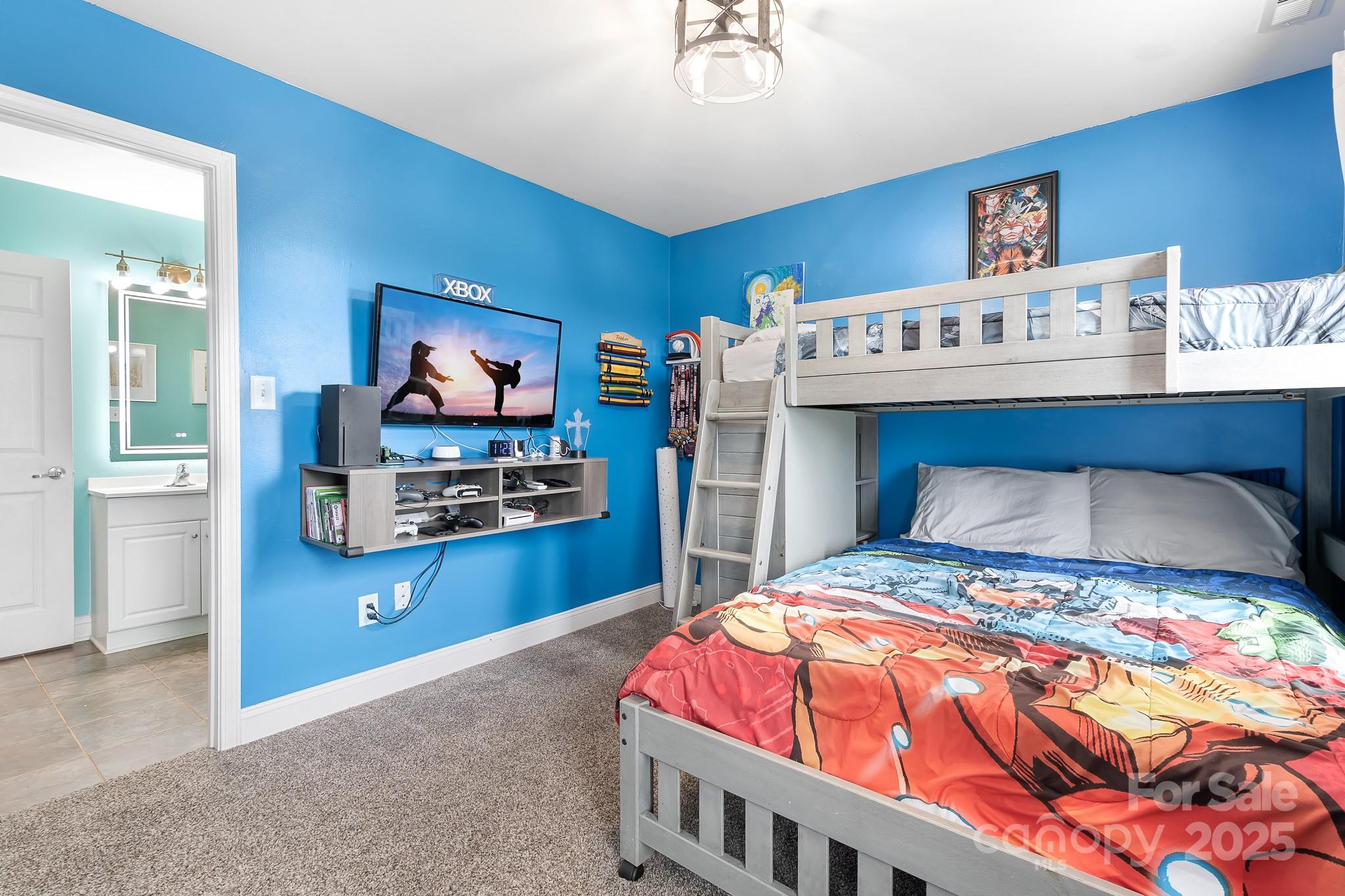 4654 Rocky Hollow Road Davidson, NC 28036 - Photo 21 of 48 a bedroom with a bed and a dresser in it