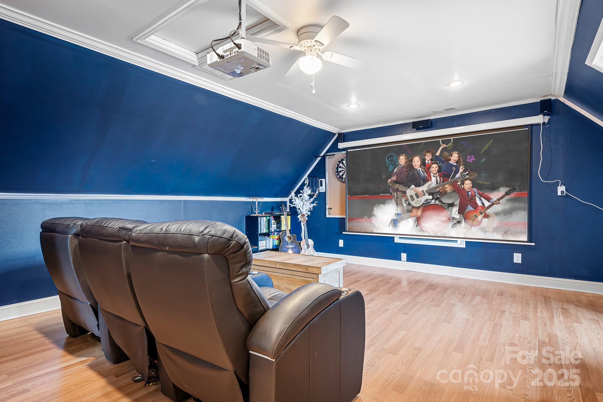 4654 Rocky Hollow Road Davidson, NC 28036 - Photo 28 of 48 a view of a livingroom with furniture and a ceiling fan