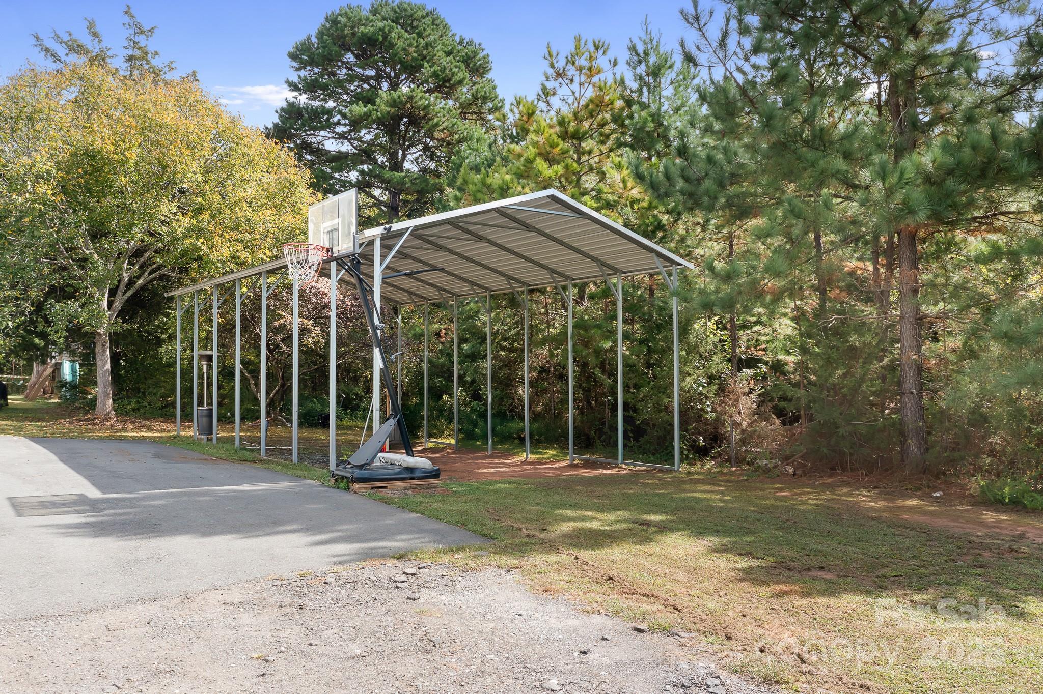 4654 Rocky Hollow Road Davidson, NC 28036 - Photo 31 of 48 a view of outdoor space with playground and green space