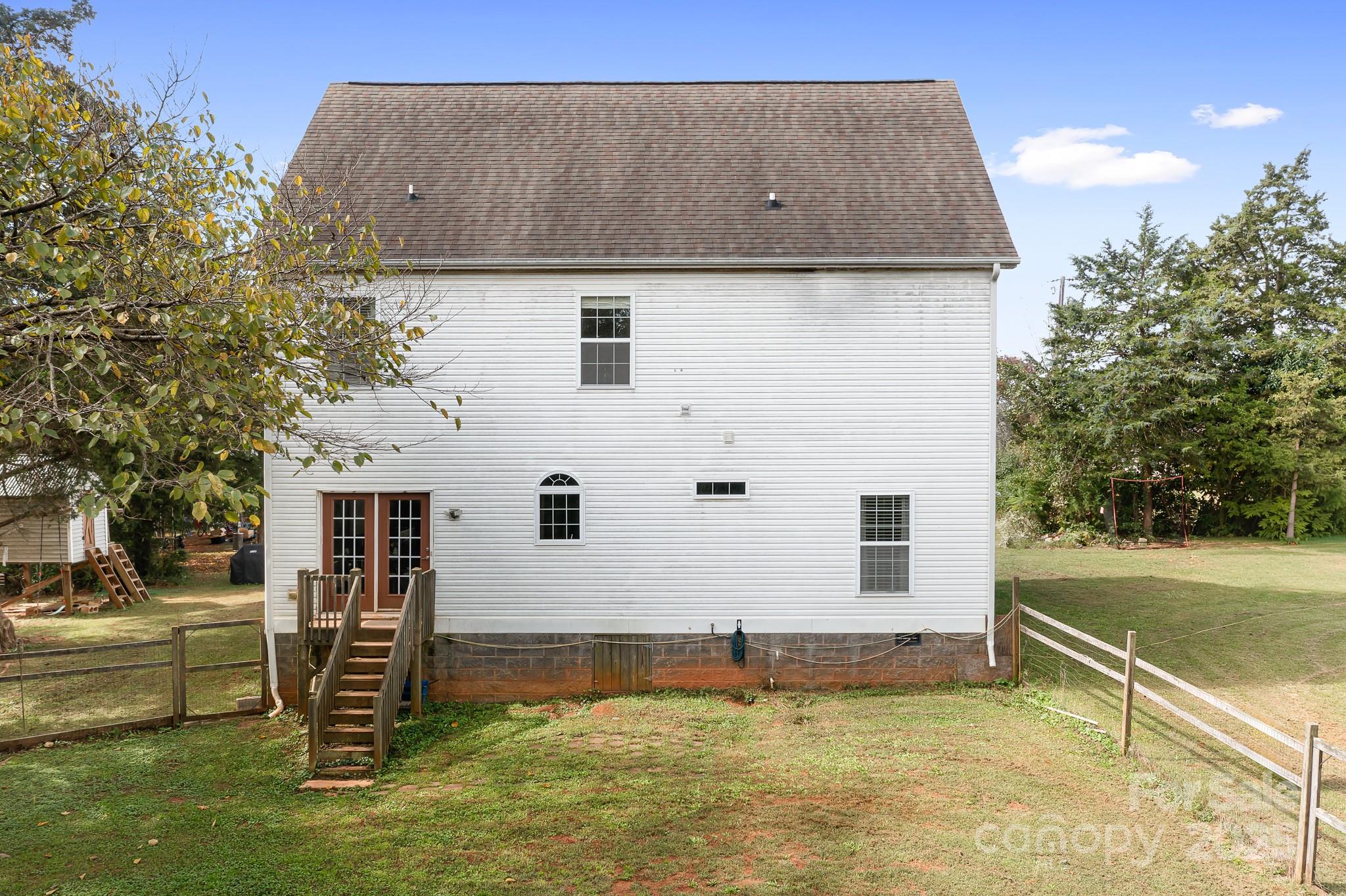 4654 Rocky Hollow Road Davidson, NC 28036 - Photo 33 of 48 a view of a house with backyard