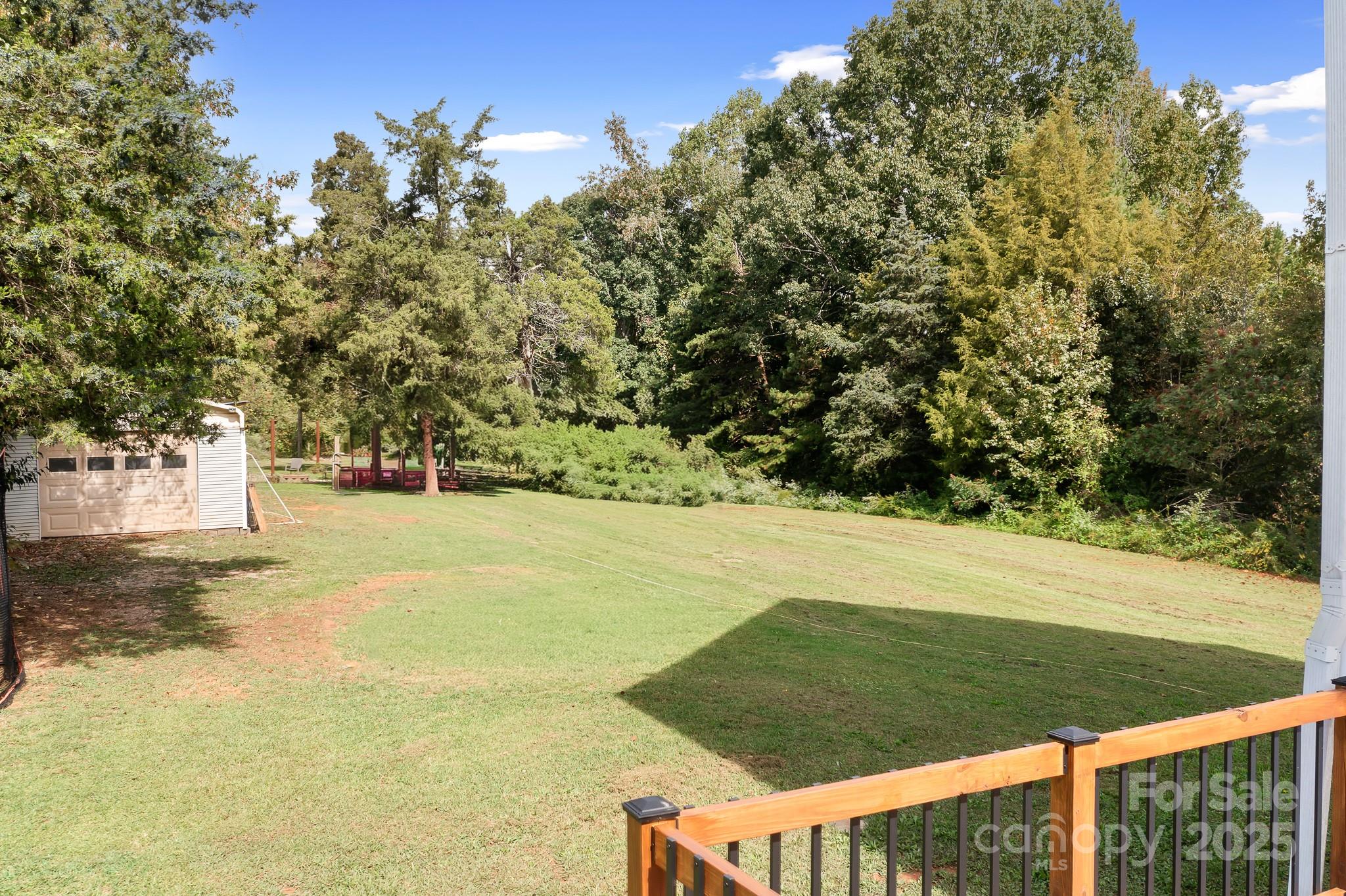 4654 Rocky Hollow Road Davidson, NC 28036 - Photo 34 of 48 a view of yard with swimming pool and green space