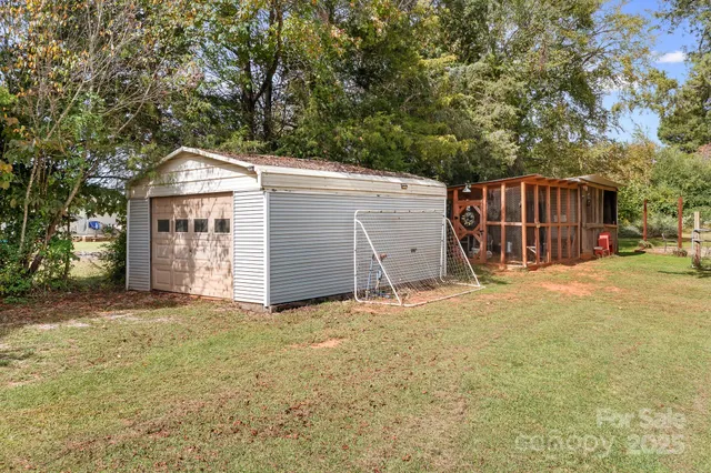 a view of a lake in middle of the forest