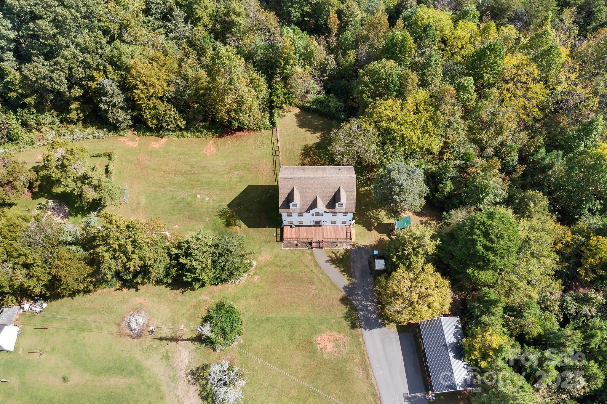 4654 Rocky Hollow Road Davidson, NC 28036 - Photo 42 of 48 a view of a lake in middle of the forest