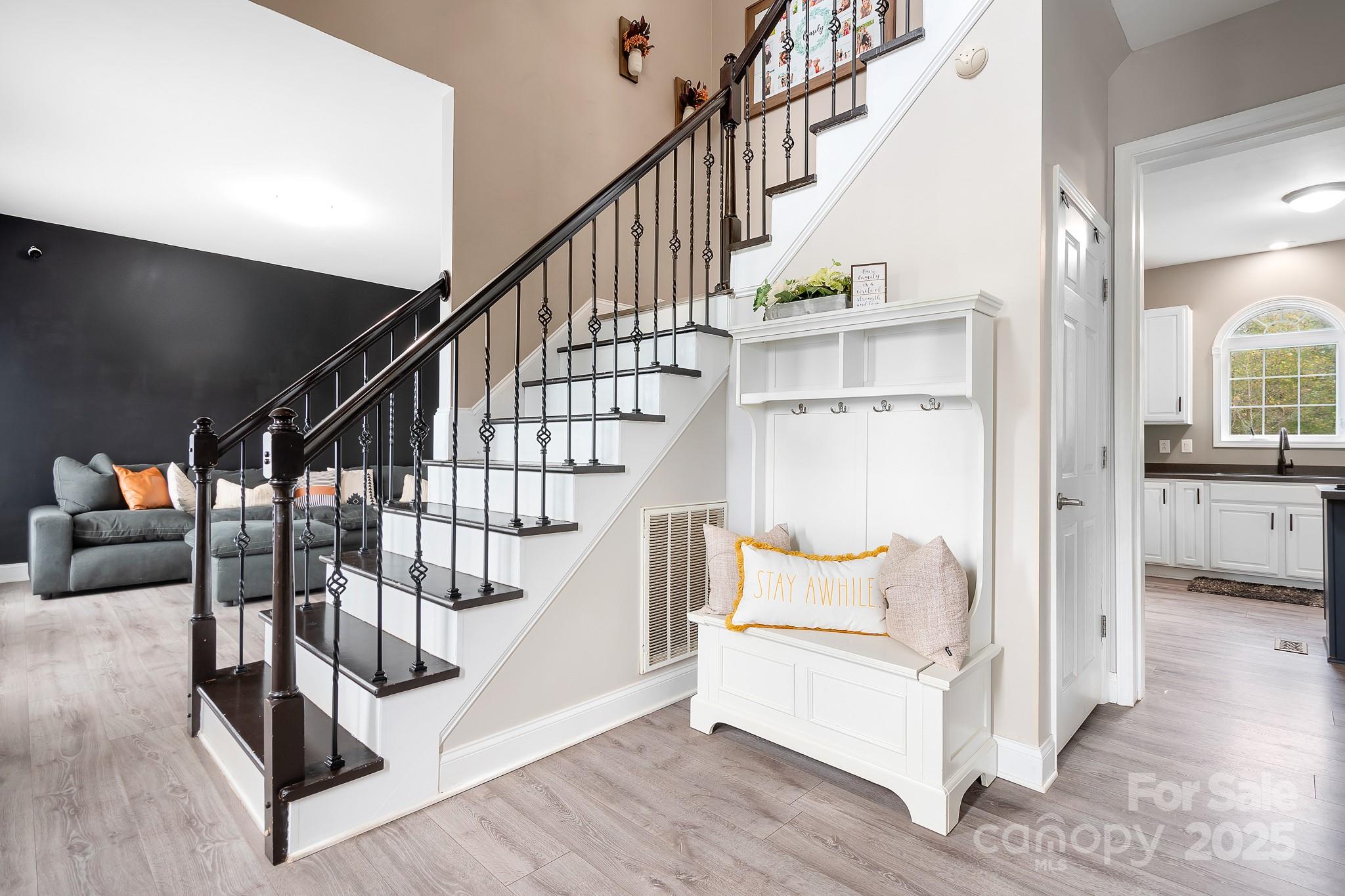 4654 Rocky Hollow Road Davidson, NC 28036 - Photo 5 of 48 a view of entryway and hall with wooden floor