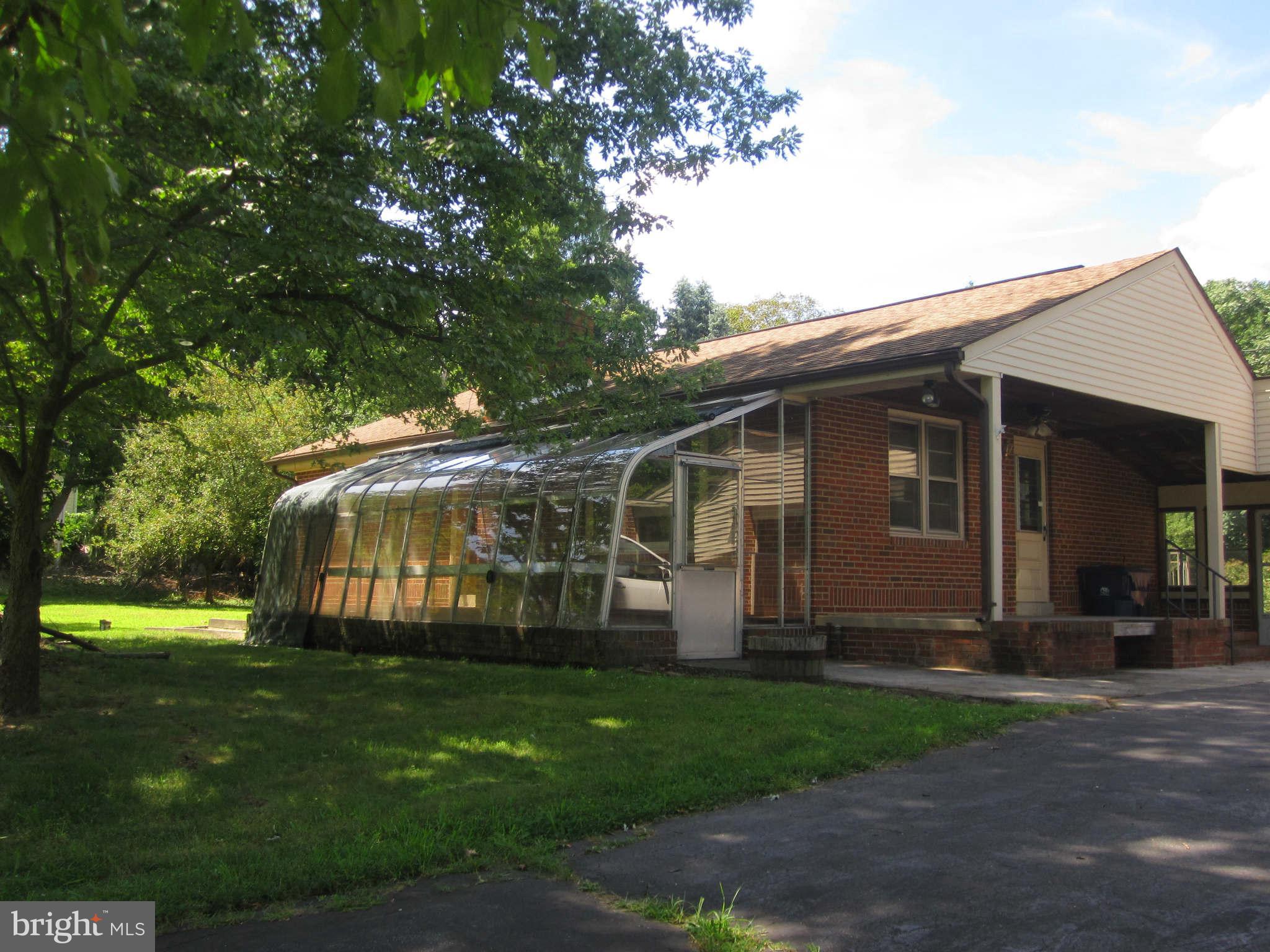 7204 Bowers Road Frederick, MD 21702 - Photo 3 of 26 front view of a house with a yard