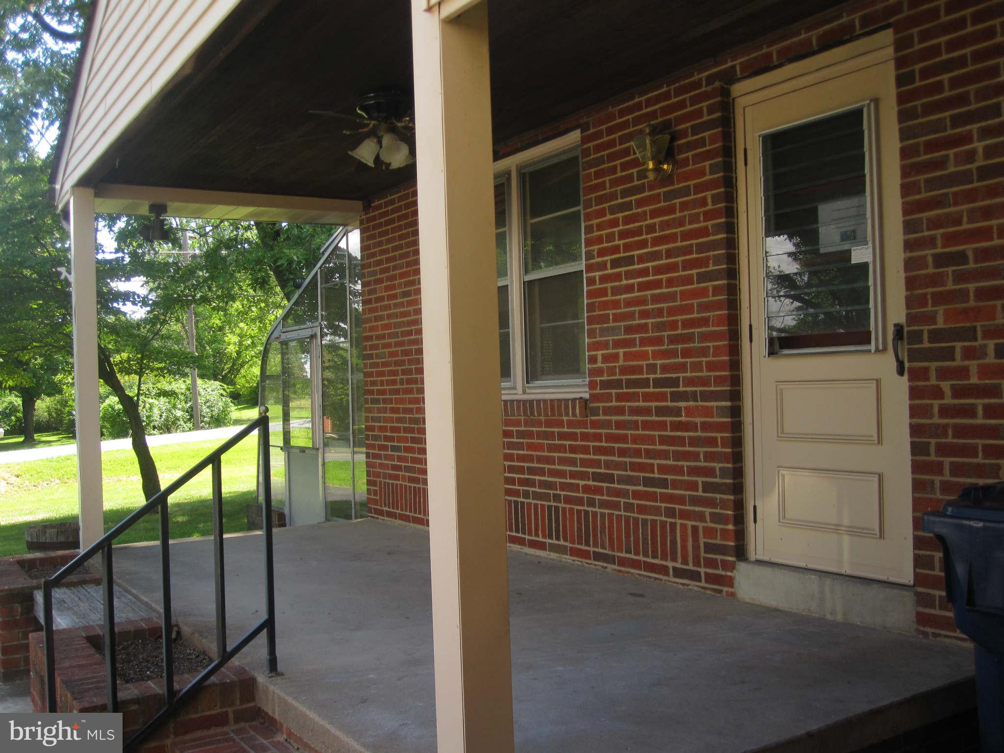 7204 Bowers Road Frederick, MD 21702 - Photo 5 of 26 a view of porch with a door