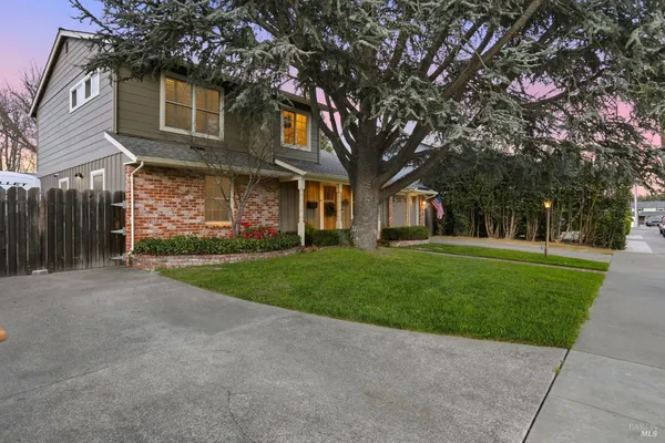 front view of a house with a yard