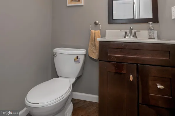 a bathroom with a toilet and a sink