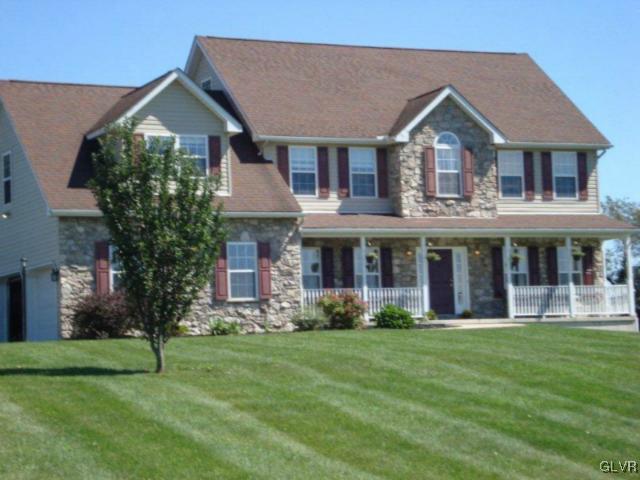 774 Bushkill Center Road Nazareth, PA 18064 - Photo 1 of 36 a front view of a house with a yard