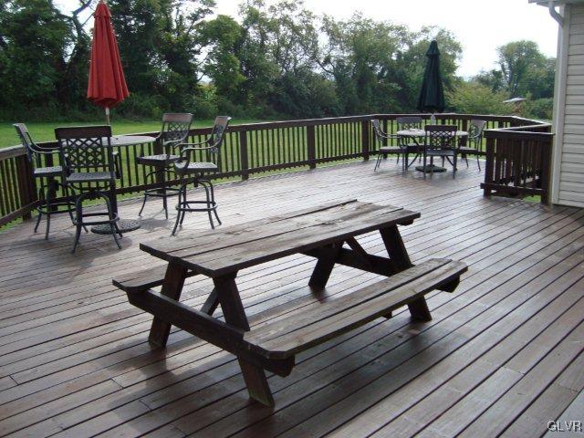 774 Bushkill Center Road Nazareth, PA 18064 - Photo 12 of 36 a view of a chairs and table on the wooden floor