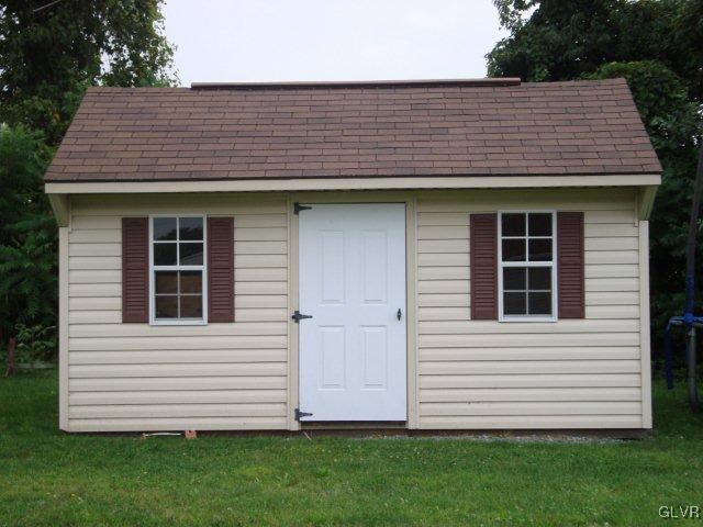 774 Bushkill Center Road Nazareth, PA 18064 - Photo 13 of 36 a front view of a house with a garden