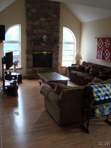 774 Bushkill Center Road Nazareth, PA 18064 - Photo 17 of 36 a living room with furniture window and a fireplace