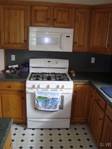 774 Bushkill Center Road Nazareth, PA 18064 - Photo 21 of 36 a stove top oven sitting inside of a kitchen