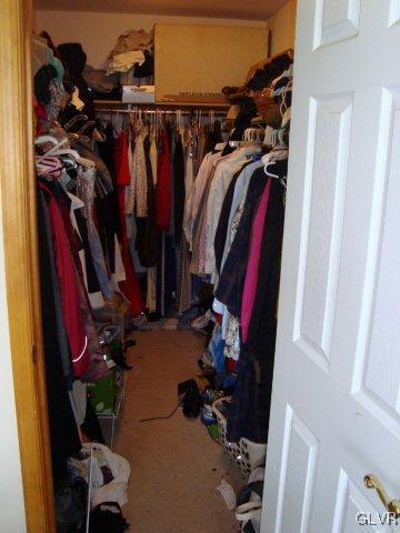 774 Bushkill Center Road Nazareth, PA 18064 - Photo 25 of 36 a view of walk in closet with clothes and shoes