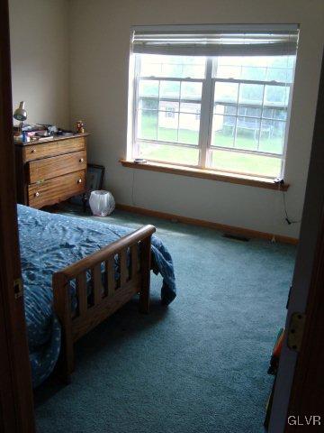 774 Bushkill Center Road Nazareth, PA 18064 - Photo 28 of 36 a bedroom with a bed and a window