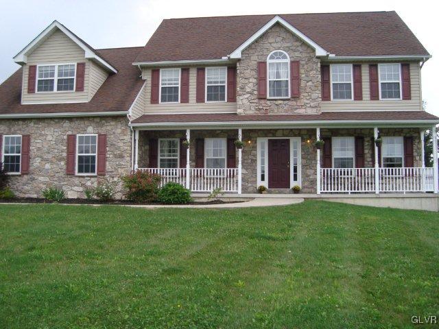 774 Bushkill Center Road Nazareth, PA 18064 - Photo 3 of 36 a front view of a house with a yard
