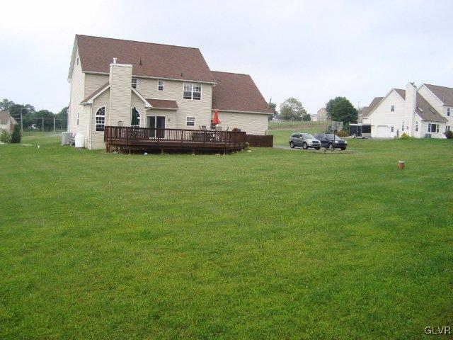 774 Bushkill Center Road Nazareth, PA 18064 - Photo 8 of 36 a view of a house with a big yard potted plants and large tree