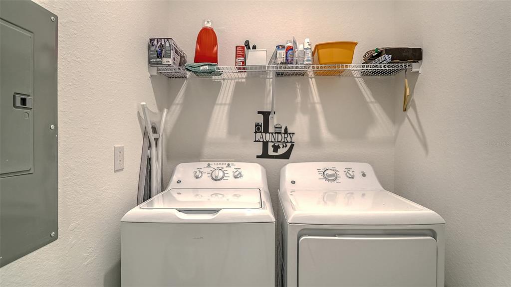 12140 Wellen Golf Street, Unit 301 Venice, FL 34293 - Photo 31 of 85 a utility room with dryer and washer