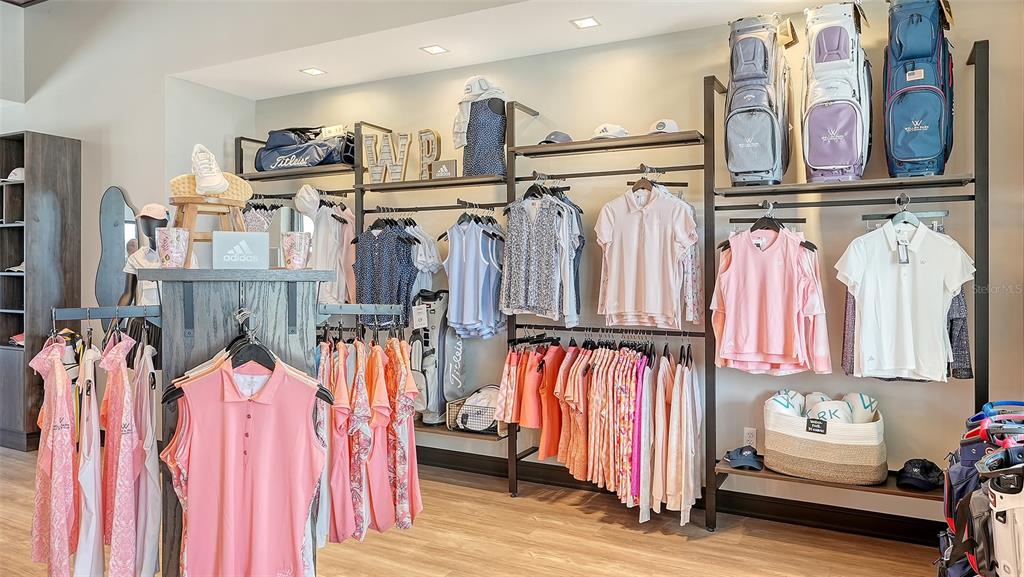 12140 Wellen Golf Street, Unit 301 Venice, FL 34293 - Photo 39 of 85 a view of walk in closet with clothes and shoes