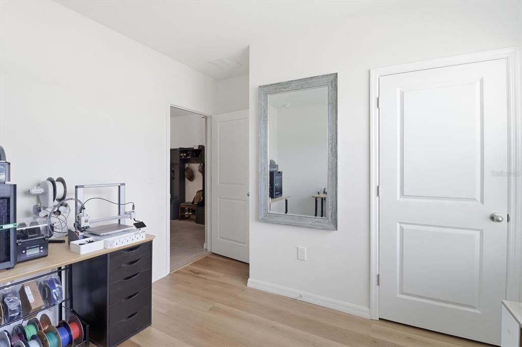 660 Hickory Course Loop Ocala, FL 34472 - Photo 22 of 45 a bathroom with a double vanity sink and a mirror