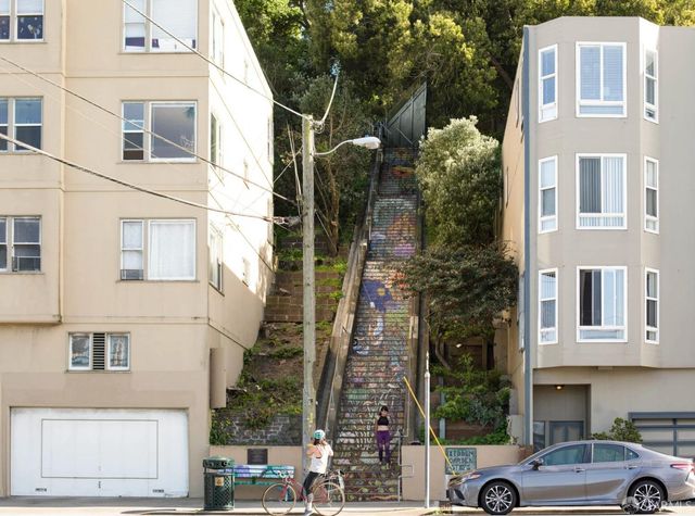 a view of a car park in front of a building