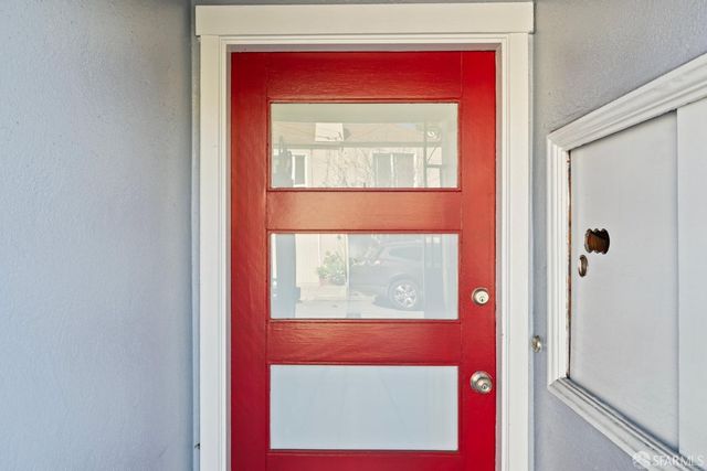 a view of a red door of the house