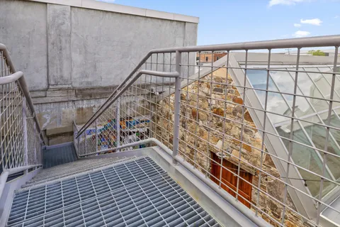 a view of staircase with large window