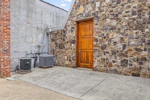 a view of a bathroom from a hallway